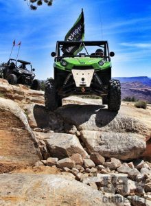 green UTV rally on the rocks