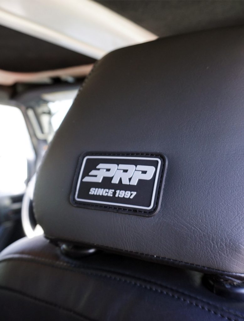 PRP Logo on the back of the headrest of our seat covers for Tacoma and Jeeps